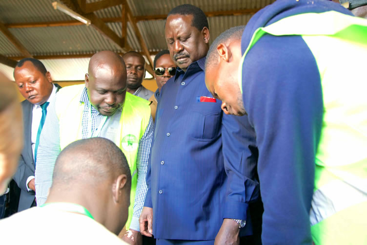 ODM leader Raila Odinga at Old Kibera Primary school polling station to cast his vote.