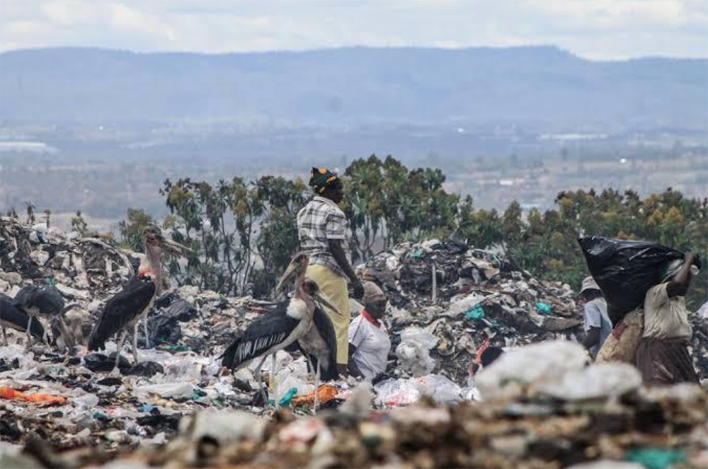 Residents of Gioto dumpsiteforage for plastics and wastes for selling to scrap metal dealers.